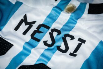 a close up of a soccer jersey with the number 22 on it