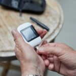 a person testing blood sugar