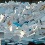 a pile of white boxes stacked on top of each other