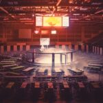 a large round table surrounded by tables and chairs