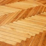 Close-up of a wooden parquet floor pattern.