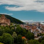 A scenic view of a town and a river