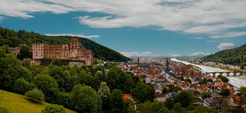 A scenic view of a town and a river