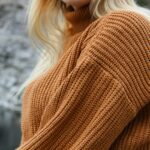 woman in brown knit sweater