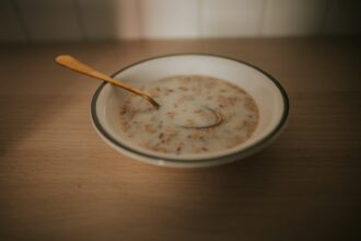 a bowl of cereal with a spoon in it