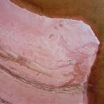 an aerial view of a pink rock formation