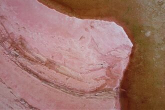 an aerial view of a pink rock formation