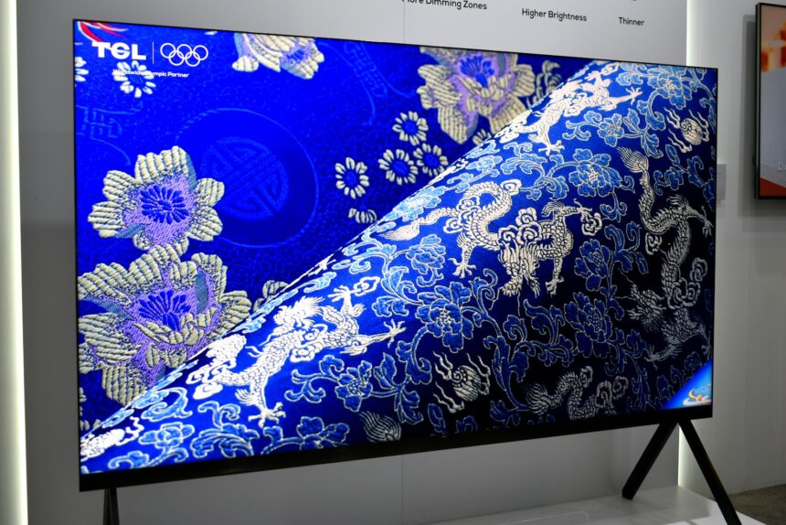 Modern television displaying blue floral and dragon patterns.