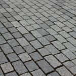 Gray cobblestone pavement.