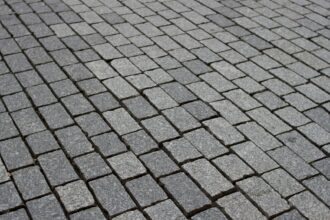 Gray cobblestone pavement.