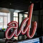 red and white love neon light signage